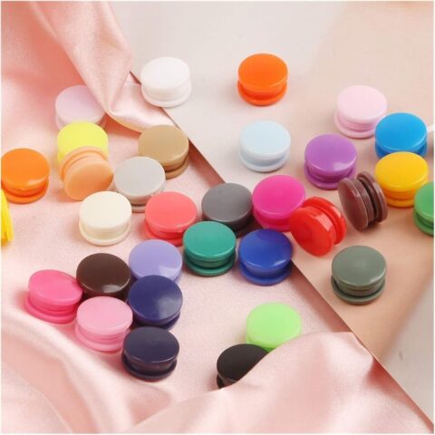 20 sets of ivory-white resin snap fasteners, perfect for garment closures and sewing projects
